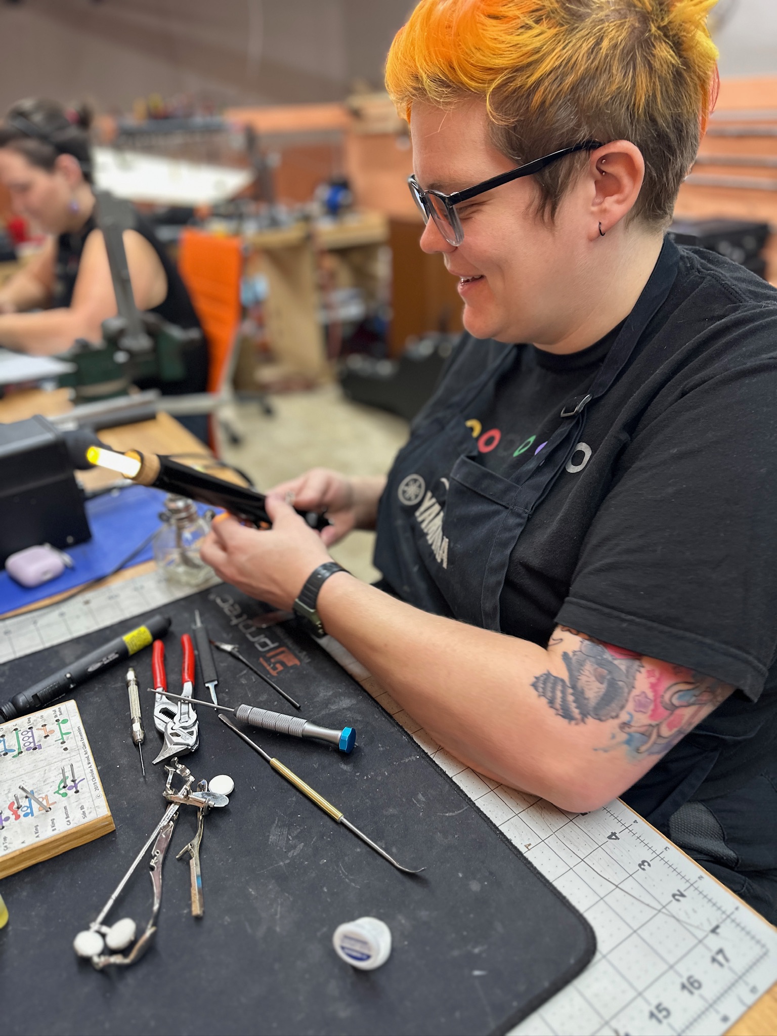 Lauren Risher making a repair