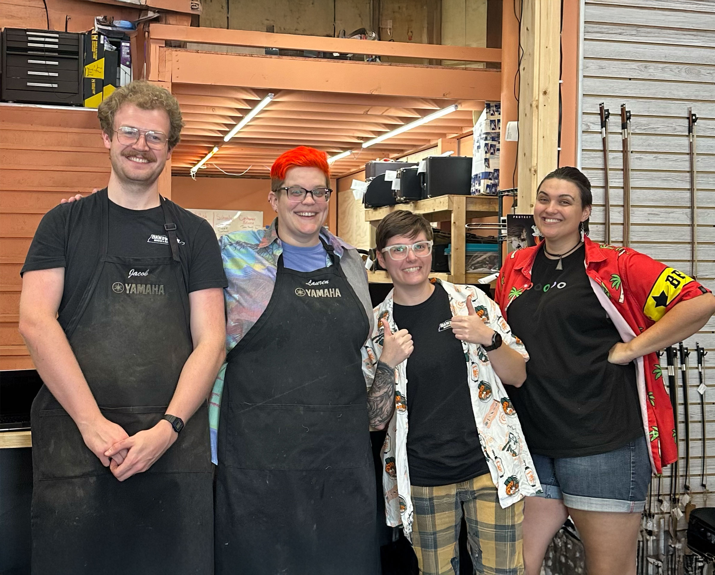 Group photo of our repair team in our store